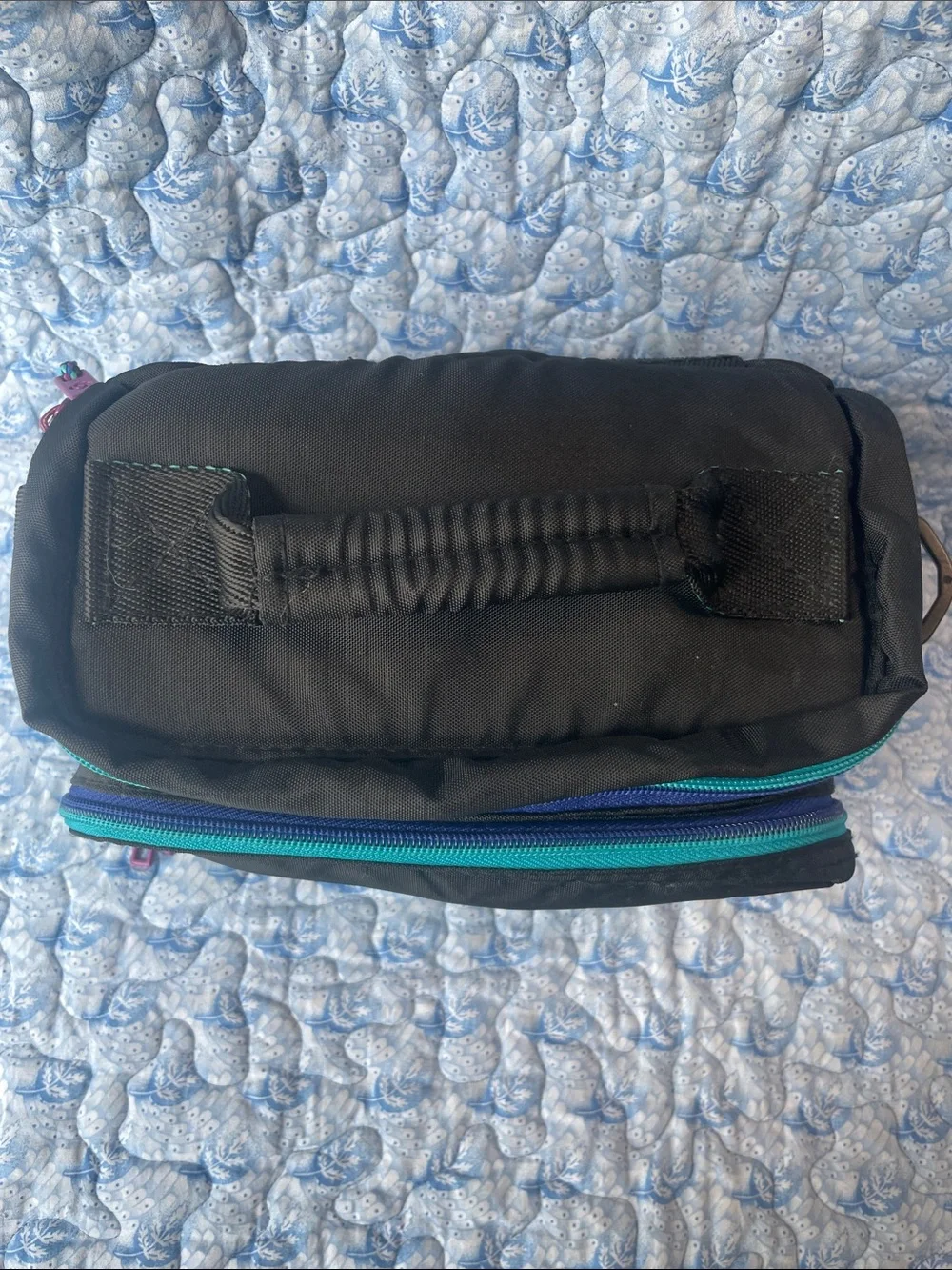 Samsonite Black Bag with Purple and Teal Logo Patch